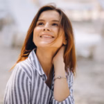 portrait-young-woman-shirt-beach_1303-9826